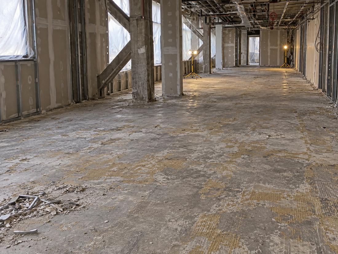 Bare concrete floor in an empty office